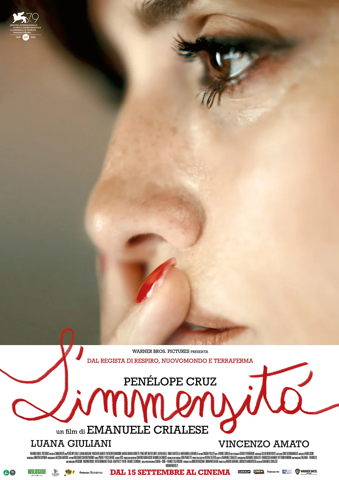 Plakat: bezmiar Twarz kobiety w zbliżeniu, przy ustach dłoń i pomalowane na czerwono paznokcie. Treść: Penelope Cruz Limmeryita.