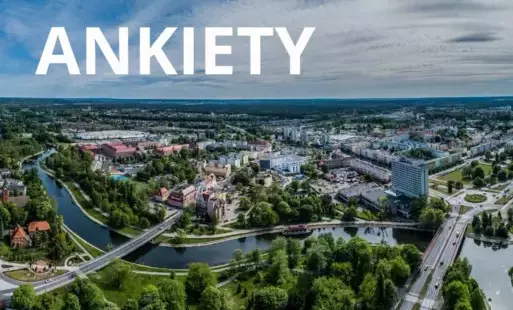 Zdjęcie miasta z lotu ptaka, napis: ANKIETY